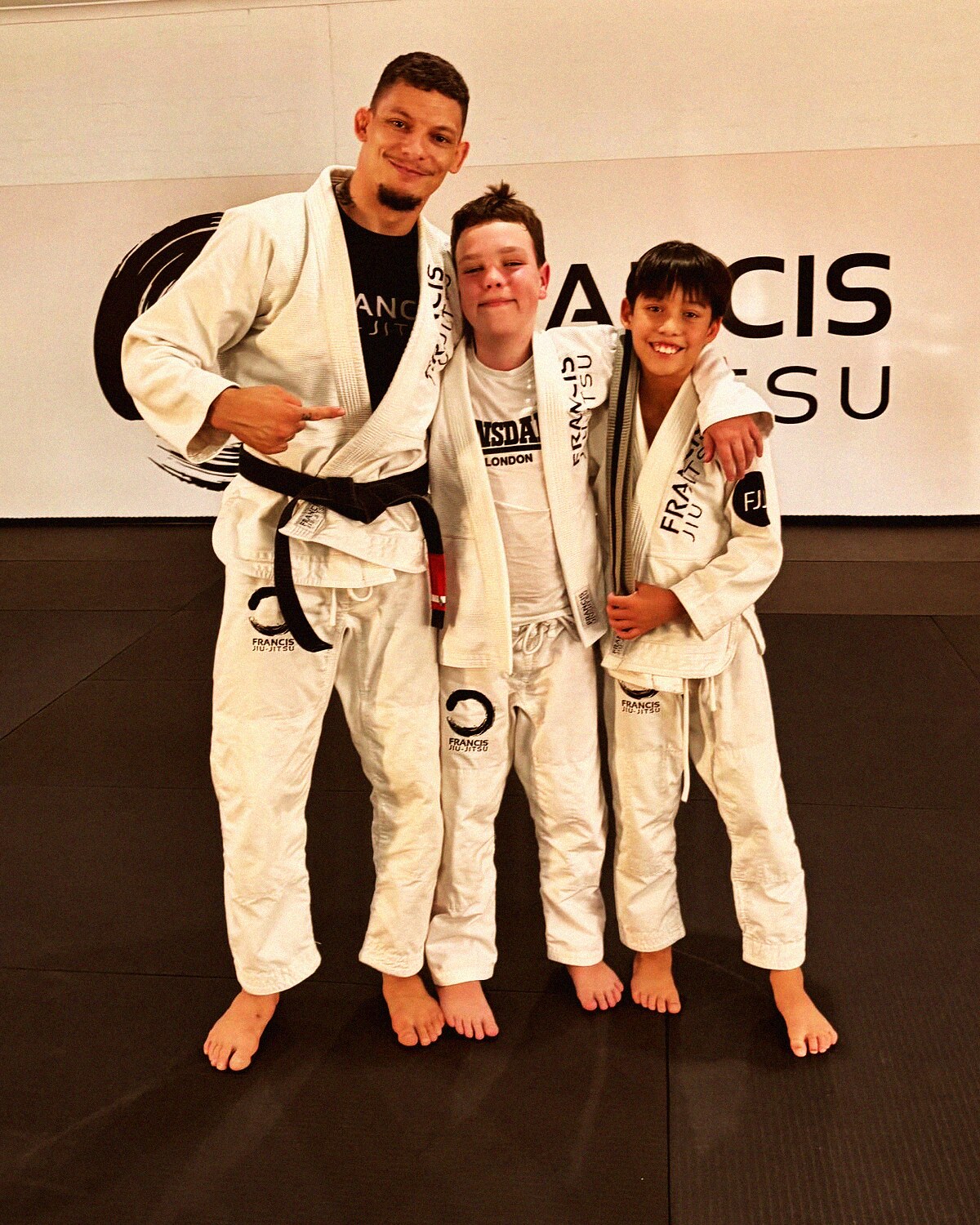 Coach Daan mentoring two FJJ students